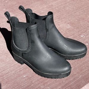 Black ankle boots with rubber snow tread soles. like new